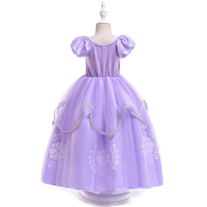 Girl wearing purple princess dress-up gown with accessories
