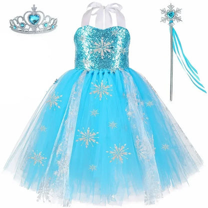 Girl wearing a glittering ice princess tutu gown with snowflake details