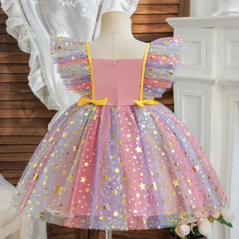 Sparkling star-accent sequin bodice on girls' pop star party dress