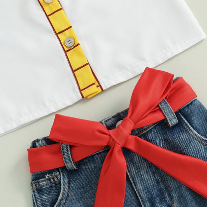 Matching headband completing the girls' cow plaid summer outfit