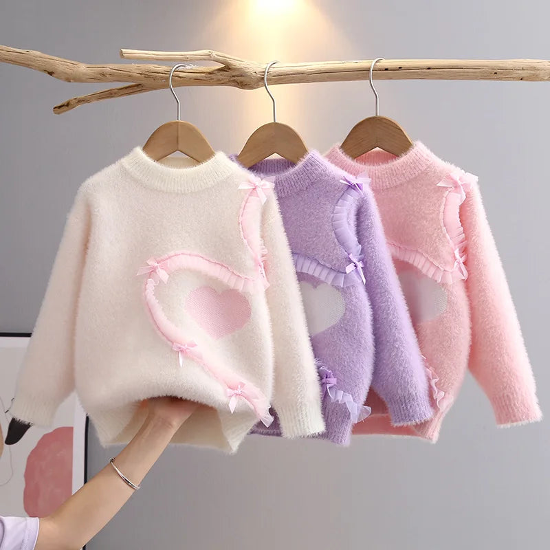 Girls' ruffle knit sweater with bow details by Magic Tree Kids