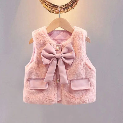 Toddler girl pink faux fur vest with faux leather bow