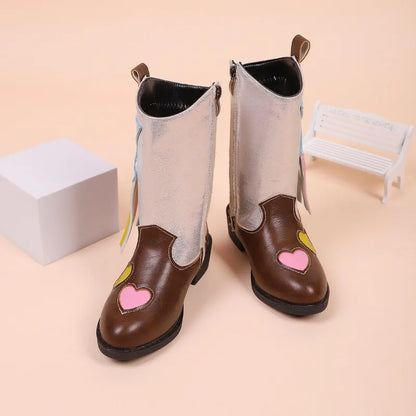 Close-up of western-style detailing on kids' cowgirl boots